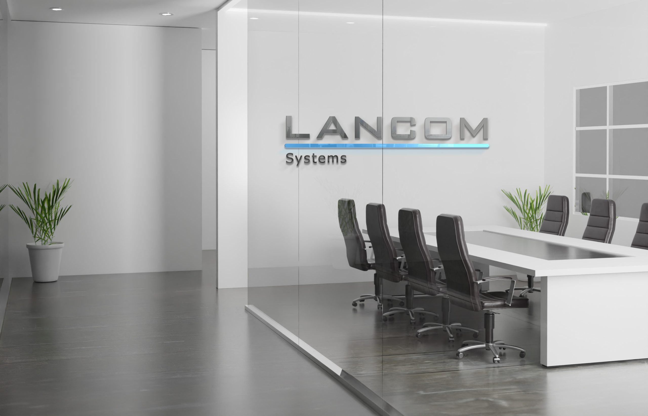 Ansicht eines modernen Büros mit Lancom Logo an der Wand.